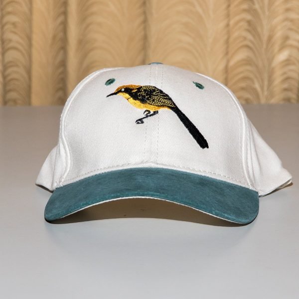 natural baseball cap with green peak and embroidered helmeted honeyeater